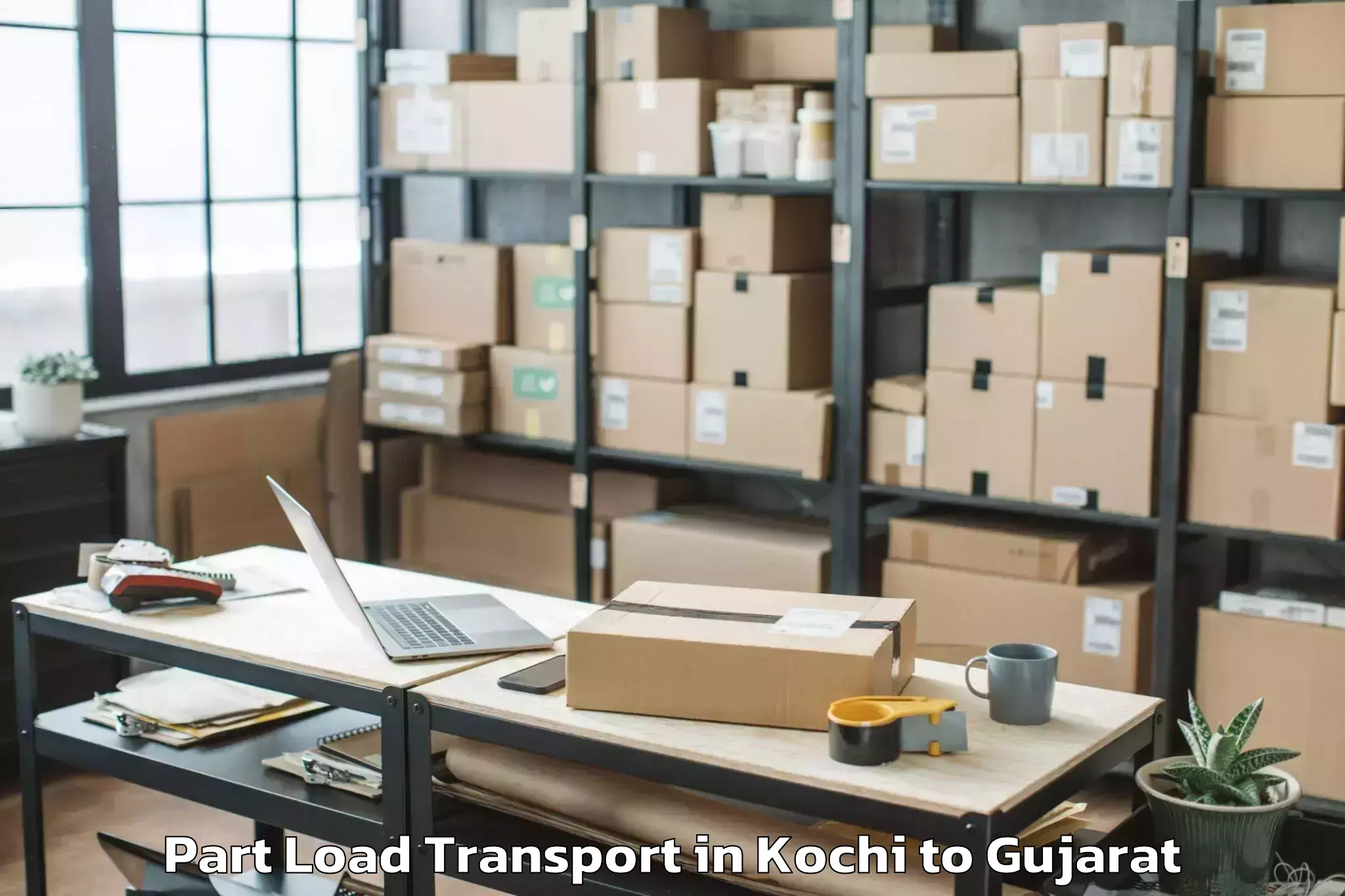 Affordable Kochi to Delvada Part Load Transport